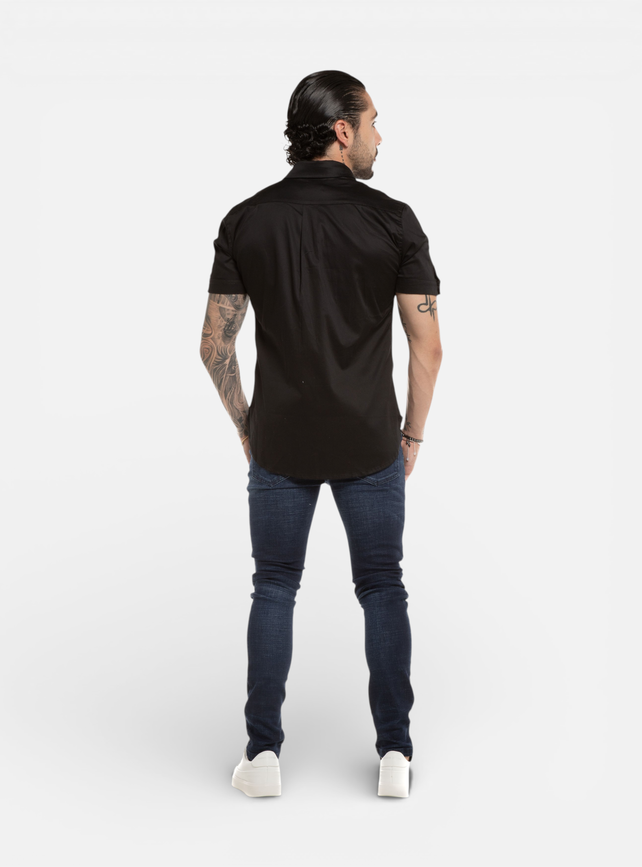 Fxckboy black stretch satin slim fit short sleeve shirt with silver accents and raised collar.