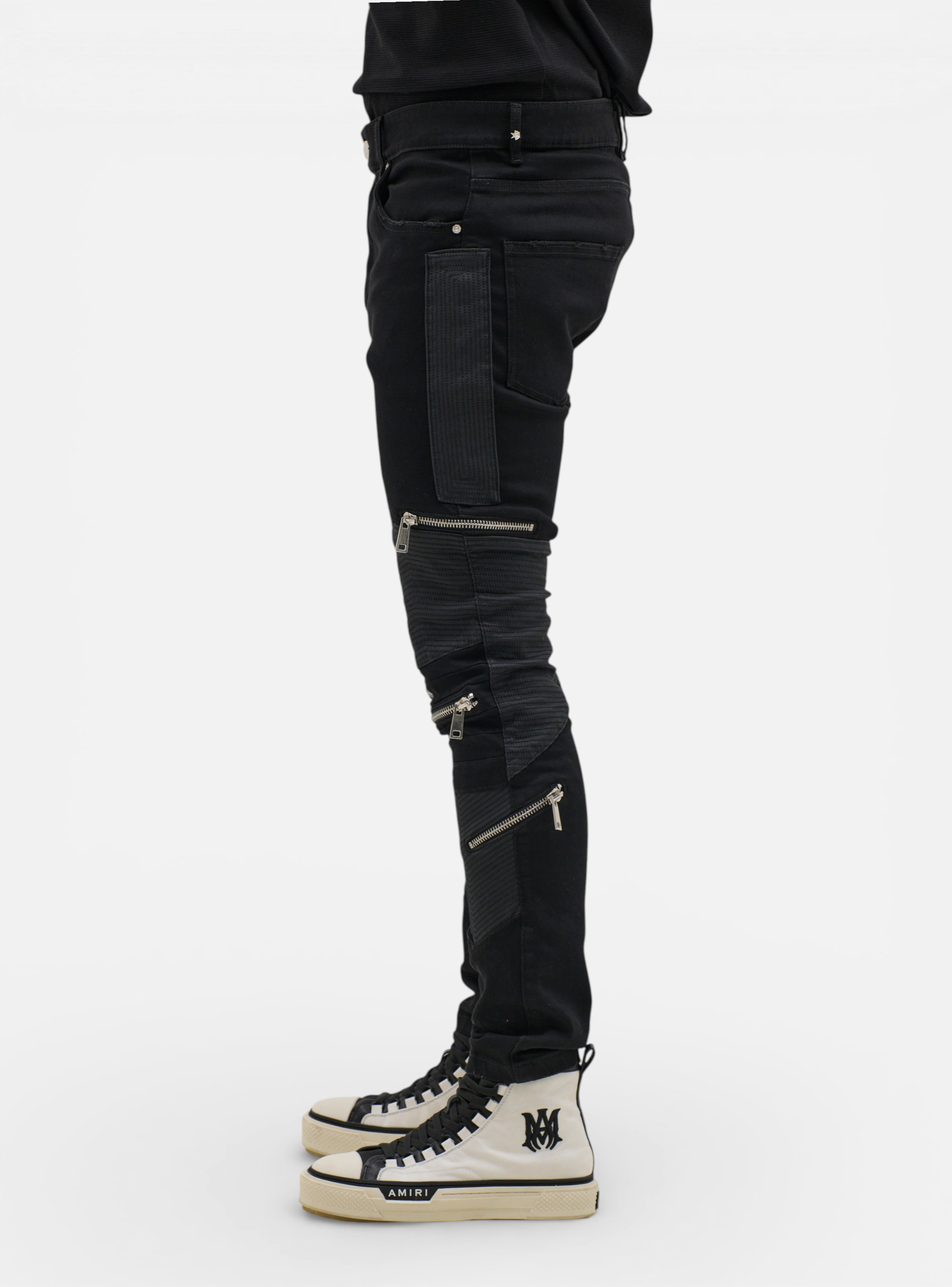 Fxckboy black skinny jeans with techno shield effect, leather accents, and multiple zippers. Cotton-polyester blend.