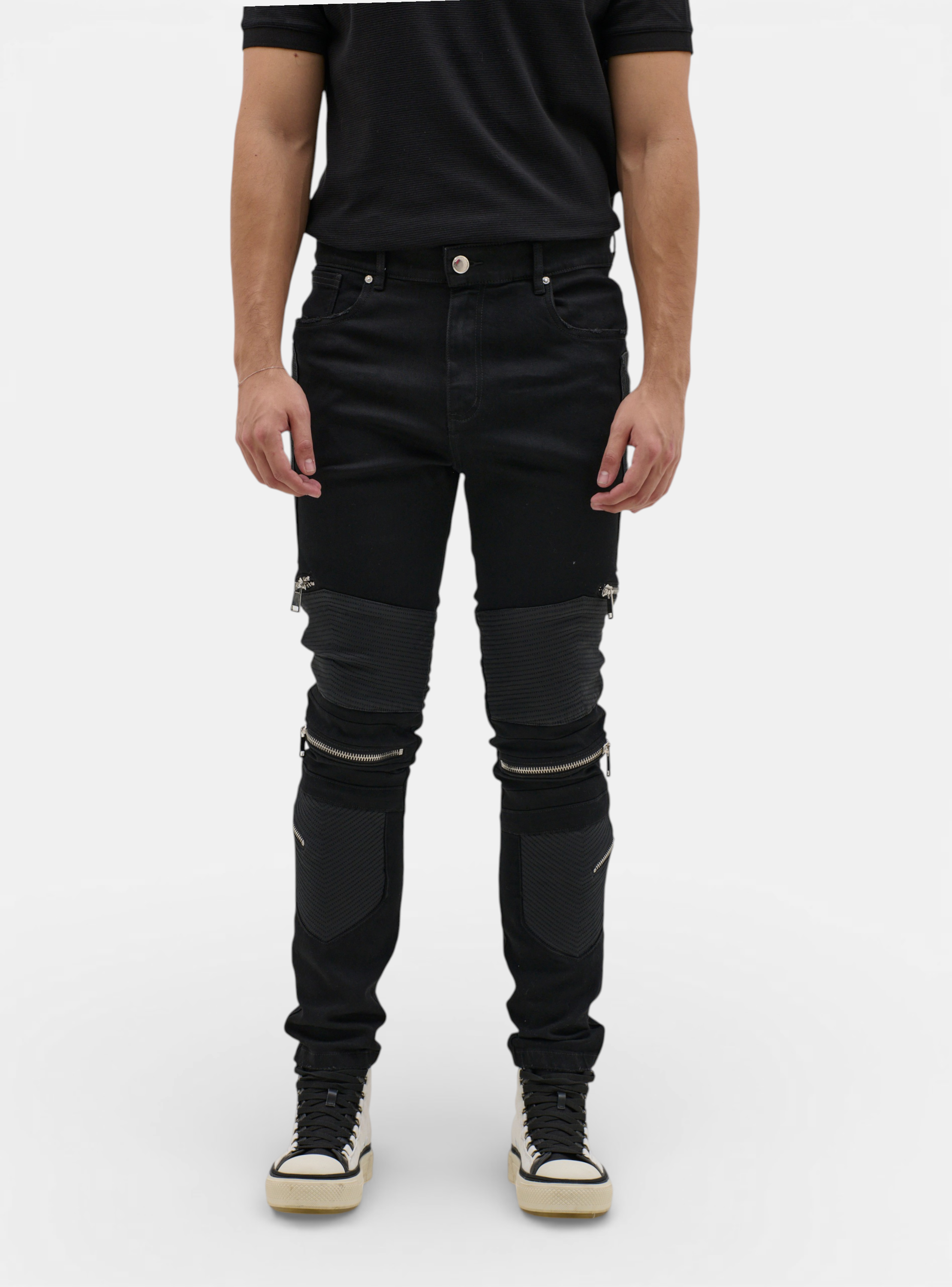 Fxckboy black skinny jeans with zippered panels and faux leather accents, cotton-polyester blend.