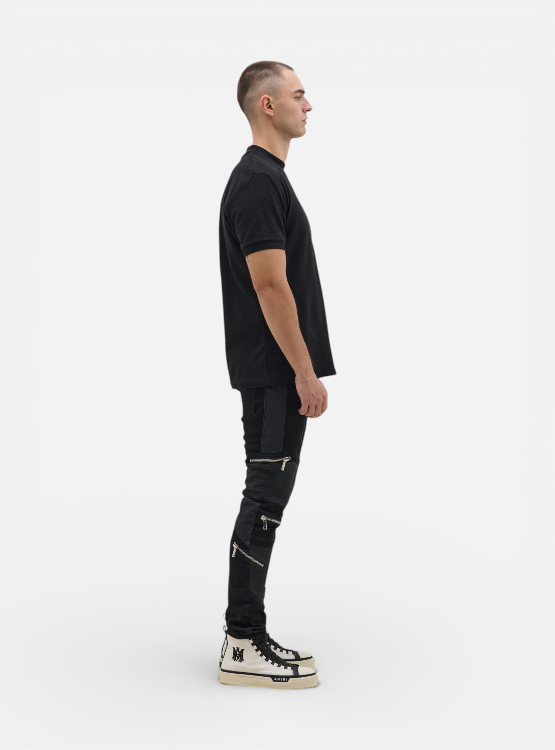 Fxckboy black skinny techno shield jeans with faux leather panels and silver zippers, cotton-polyester blend.