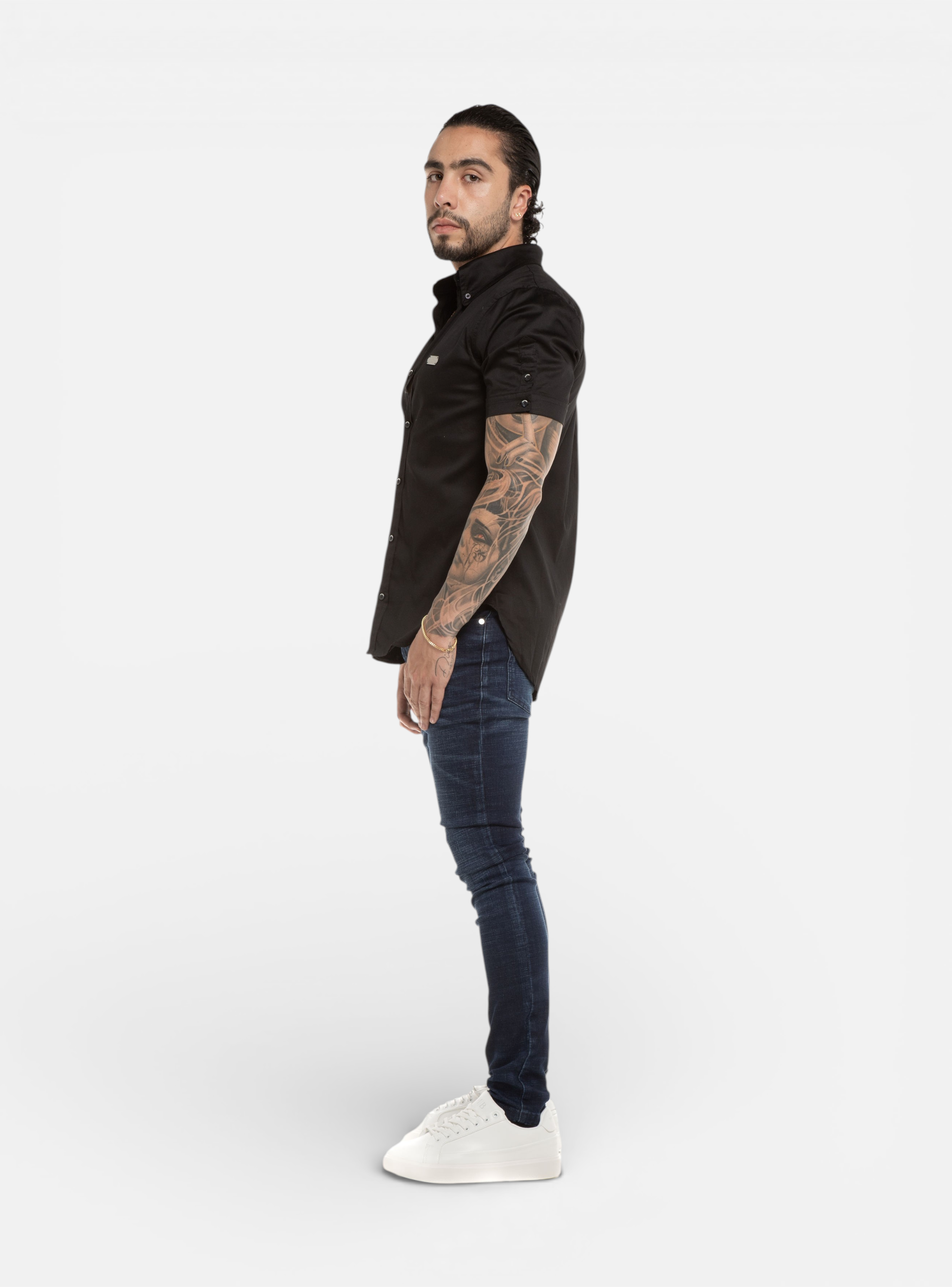 Fxckboy black slim fit stretch satin shirt with silver accents and raised collar. Short sleeves, button-up style.