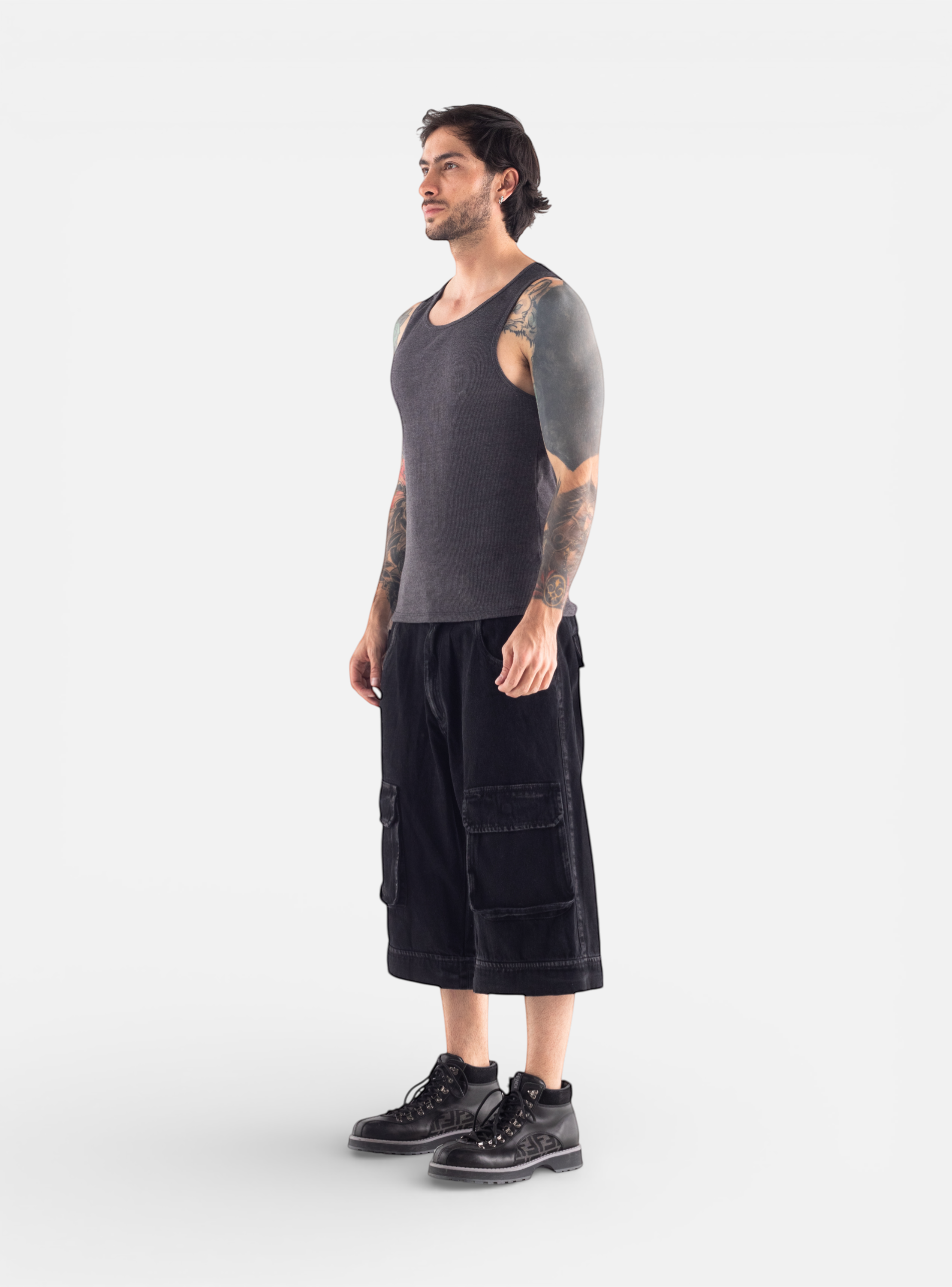 Fxckboy black relaxed fit utility jeans with multiple cargo pockets and detachable legs for shorts.