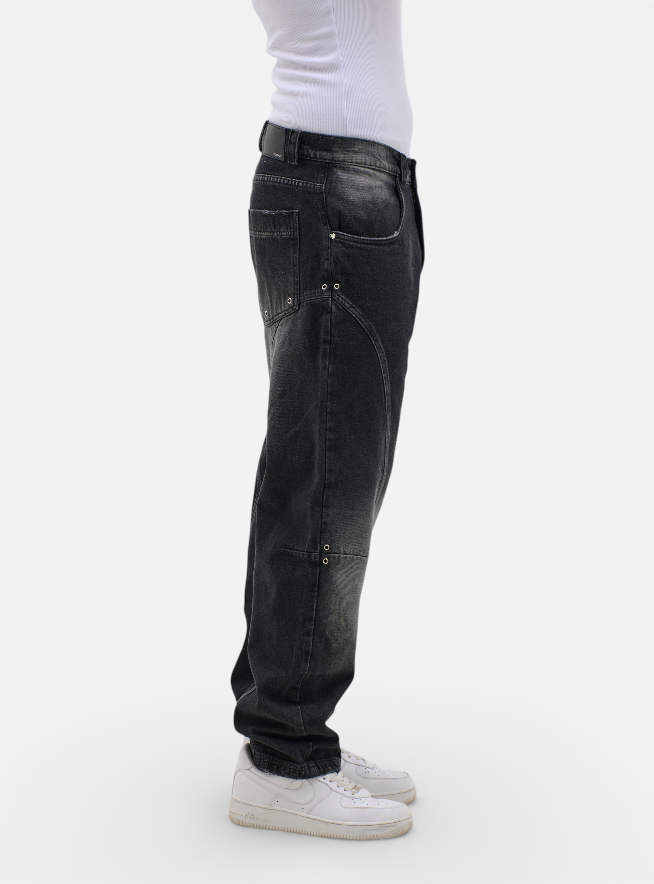 Fxckboy Relaxed System 07 dark grey washed denim jeans with technical design details.