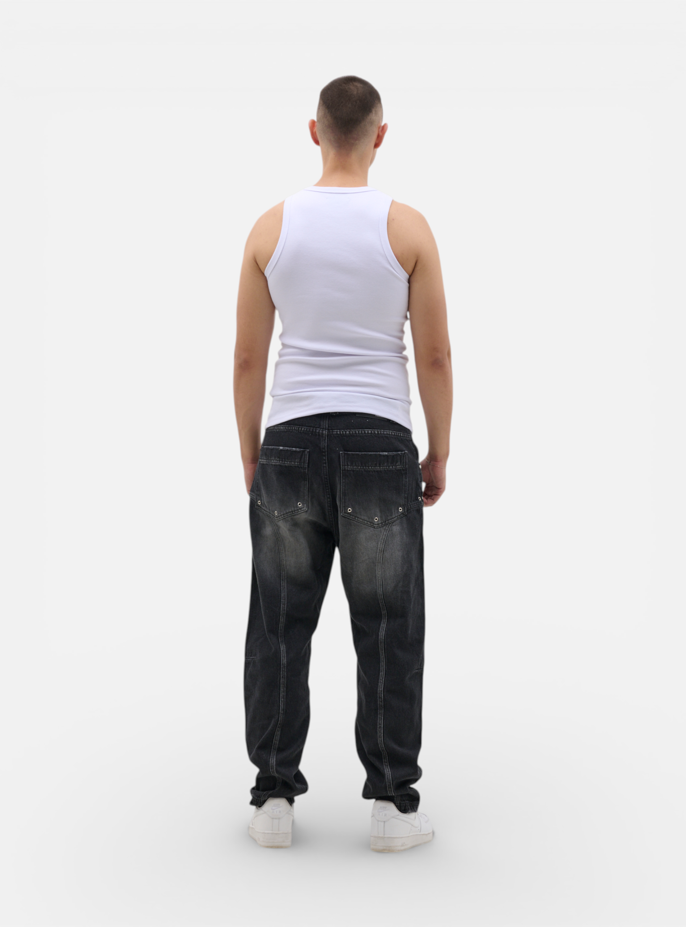 Fxckboy Relaxed System 07 dark grey washed denim jeans with technical design and relaxed fit.
