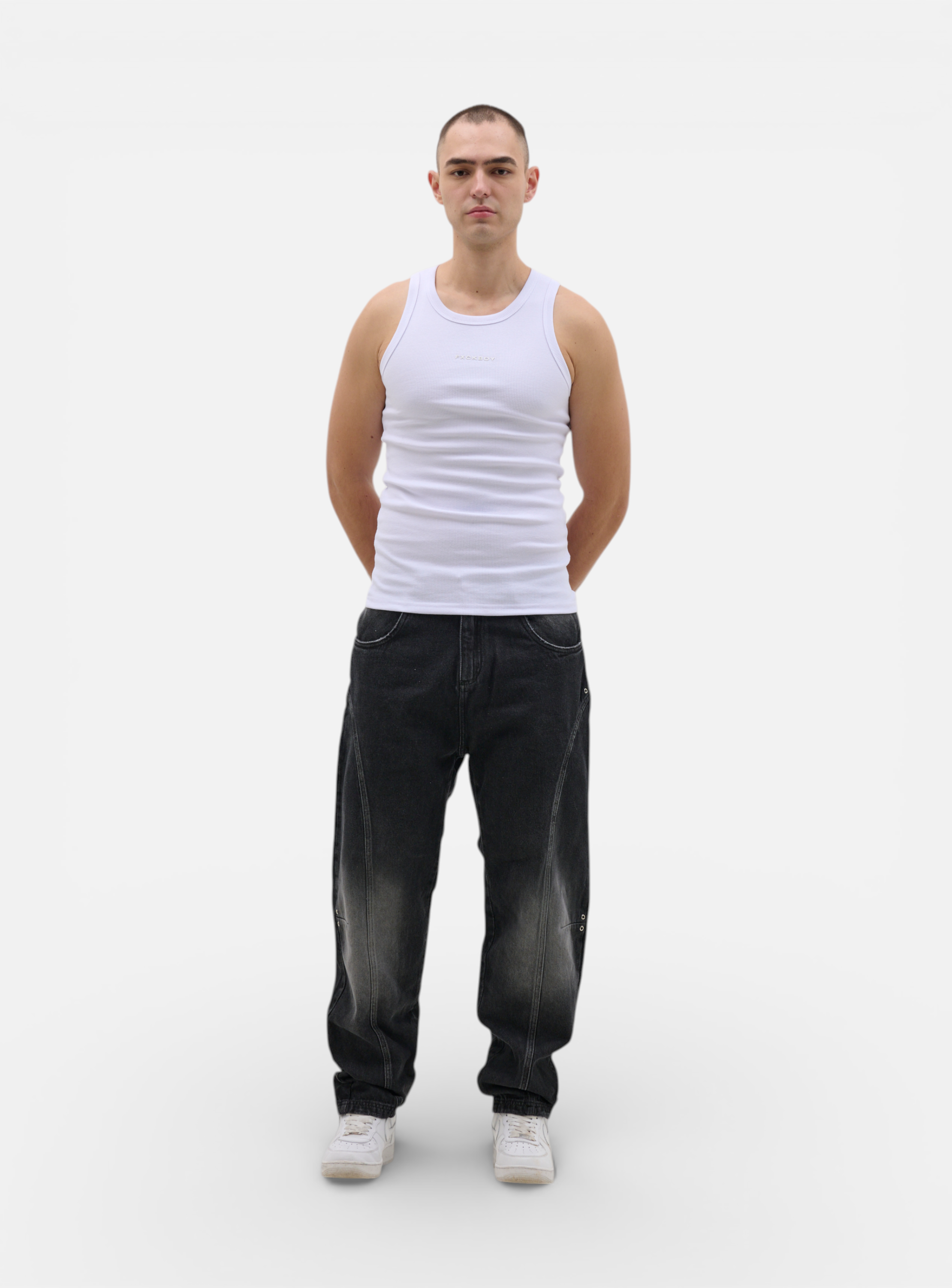 Fxckboy Relaxed System 07 dark grey washed denim jeans with technical design and metal eyelet details.