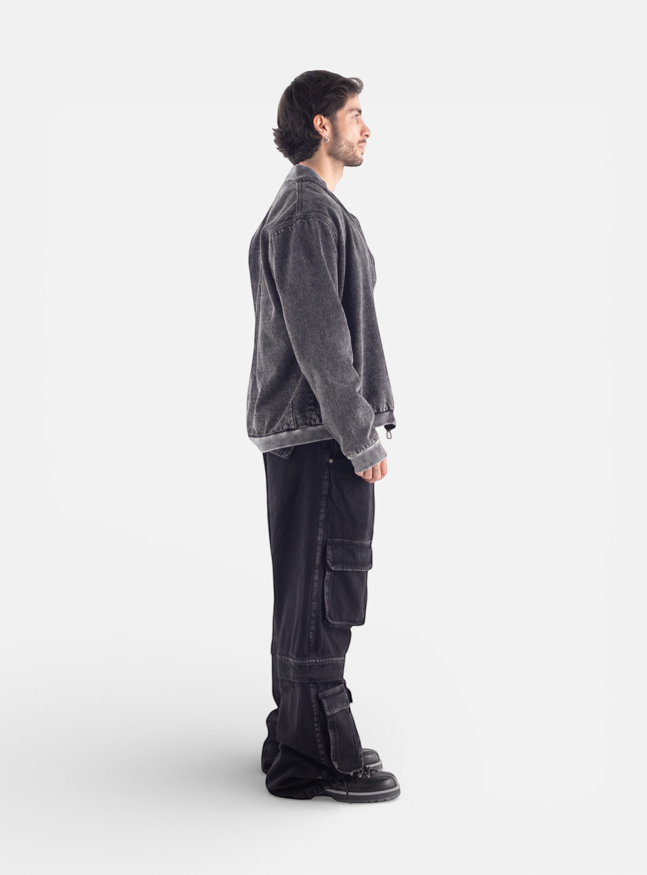 Fxckboy dark grey relaxed fit denim utility pants with large cargo pockets and detachable legs for urban shorts.