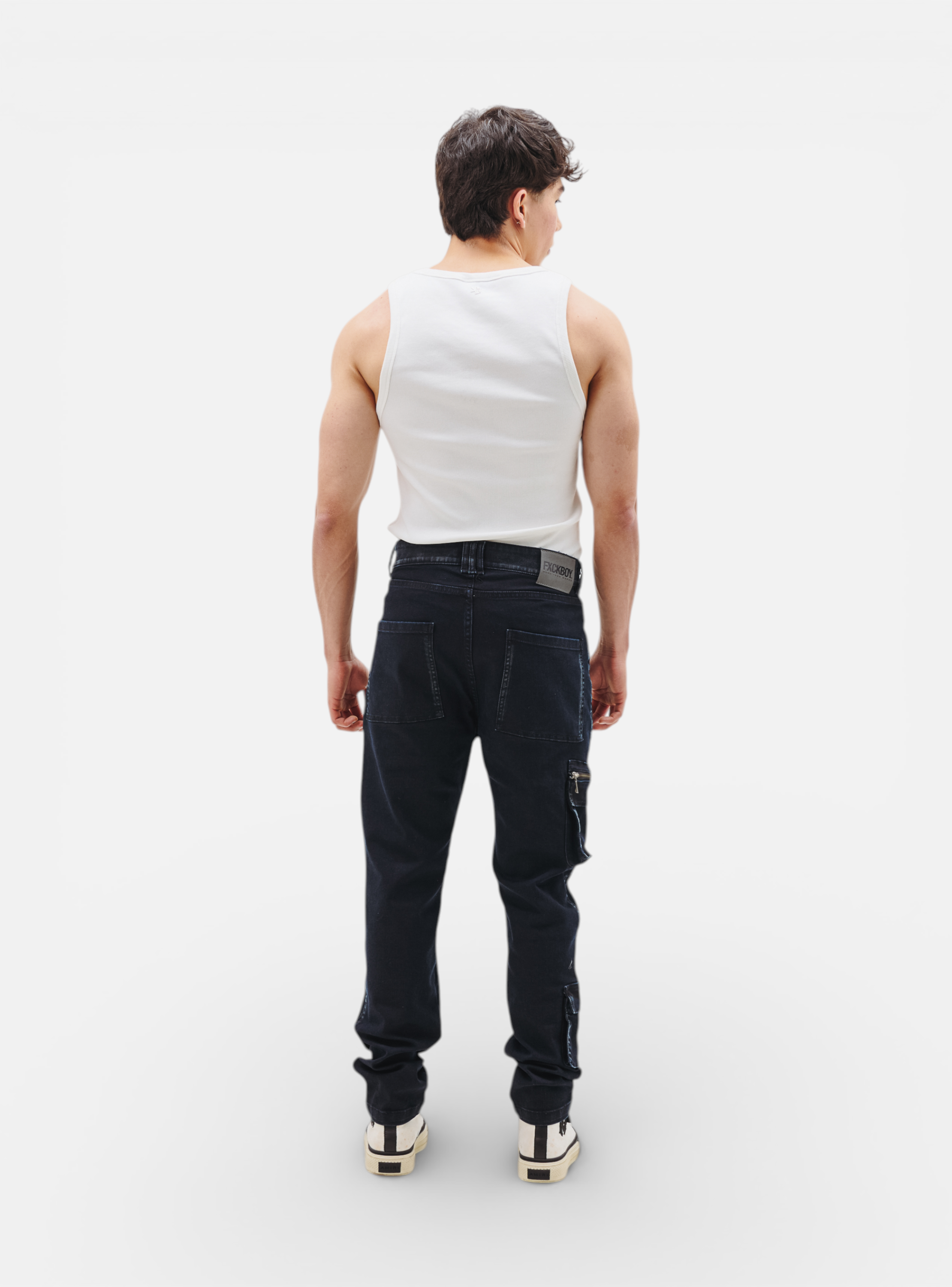 Fxckboy dark wash skinny cargo jeans with zippered pocket detail, made from Dakota fabric.