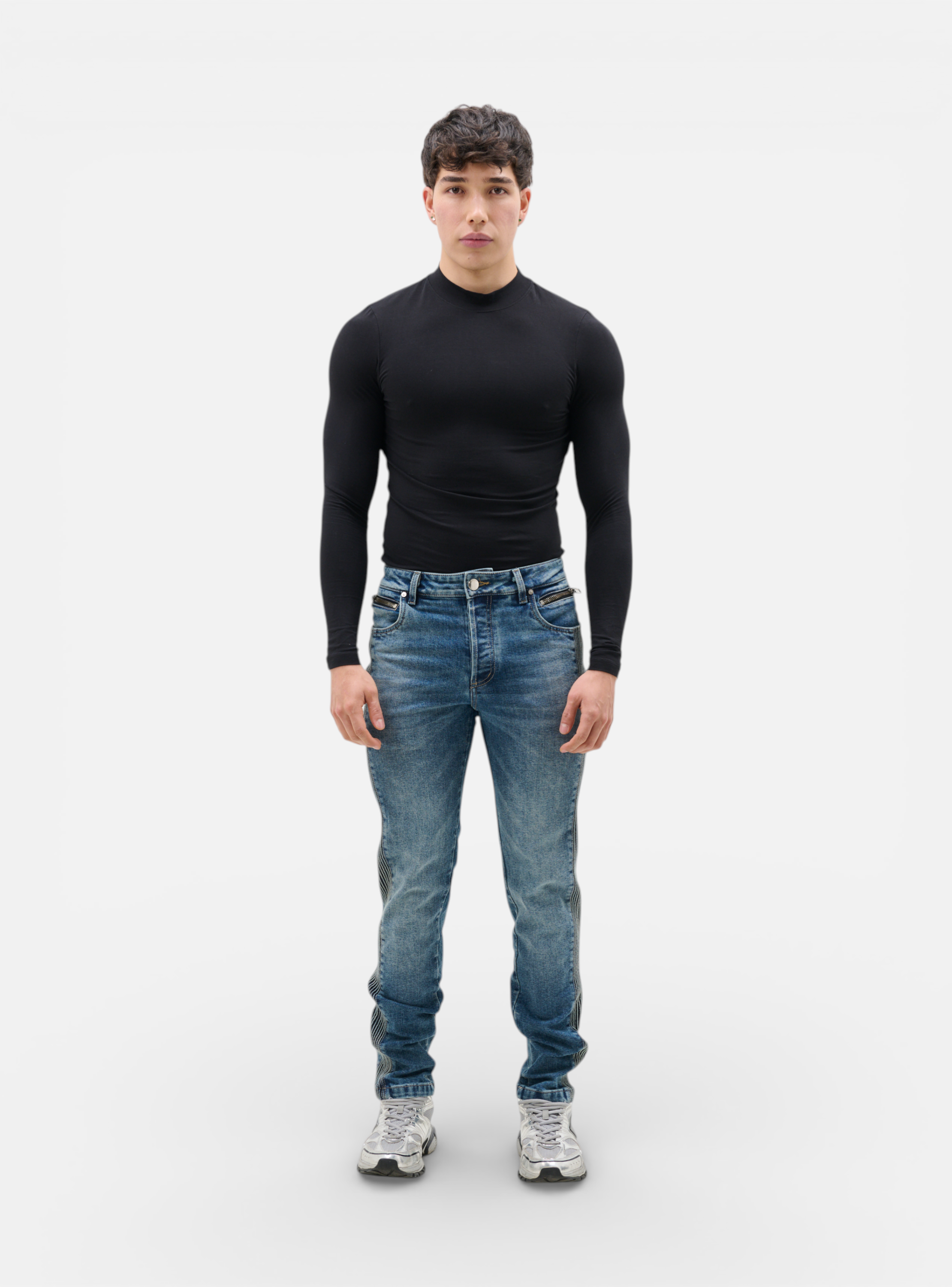 Fxckboy men's slim fit blue denim jeans with black striped side panels and zip pockets.
